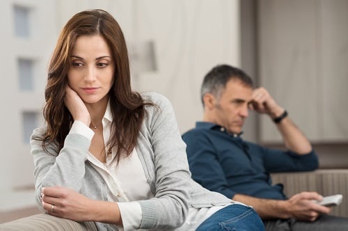 Divorce couple on sofa