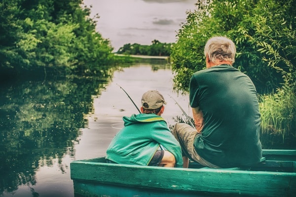 Grandfather with grandson fishing